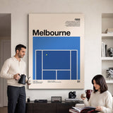 Two people viewing the The Aussie Slam tennis canvas print together in a home setting