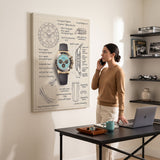 Woman on the phone looking at The Azure Design chronograph blueprint canvas in a bright study