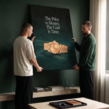 Two men hanging The Cost Is Time canvas on a green wall
