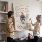 Couple holding The Espresso Design watch blueprint canvas in a bright living room