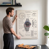 Man hanging The Meridian Design GMT watch blueprint canvas in a bright study above a leather watch roll