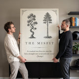 Two co-founders carrying The Misfit tree quote canvas in their office