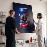Well Spent crushed blue and red cola can with a steel watch canvas wall art on a wall with two people beside it