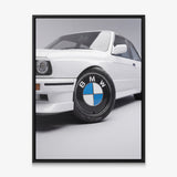 Wheels For Winners German motorsport racing wheel canvas wall art in a black floating frame
