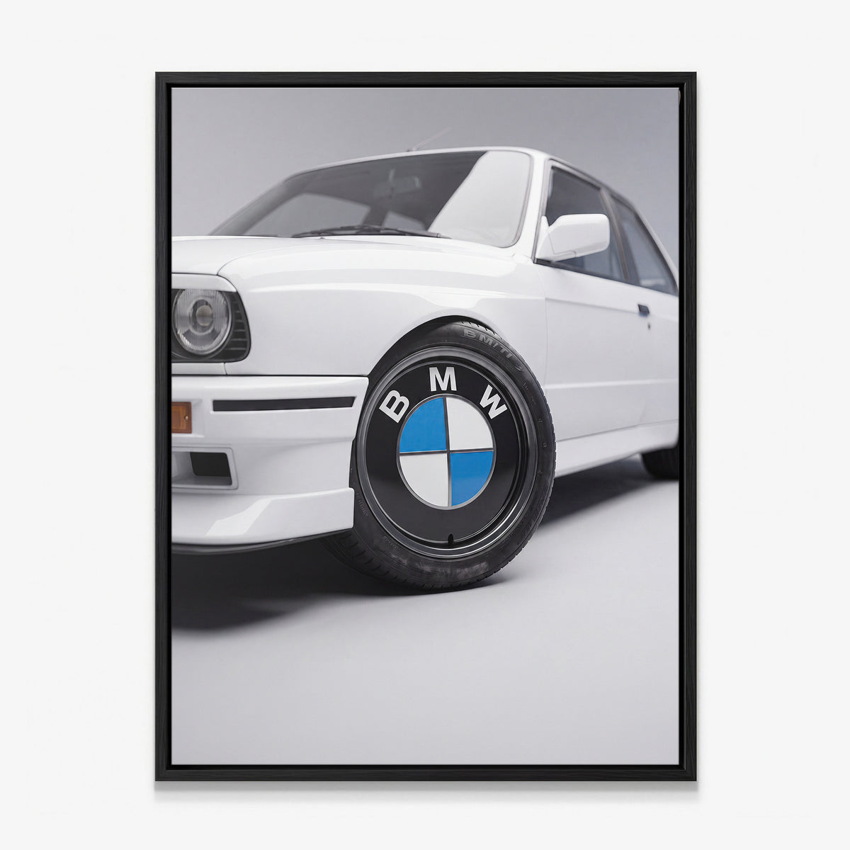 Wheels For Winners German motorsport racing wheel canvas wall art in a black floating frame