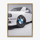 Wheels For Winners German motorsport racing wheel canvas wall art in a gold floating frame