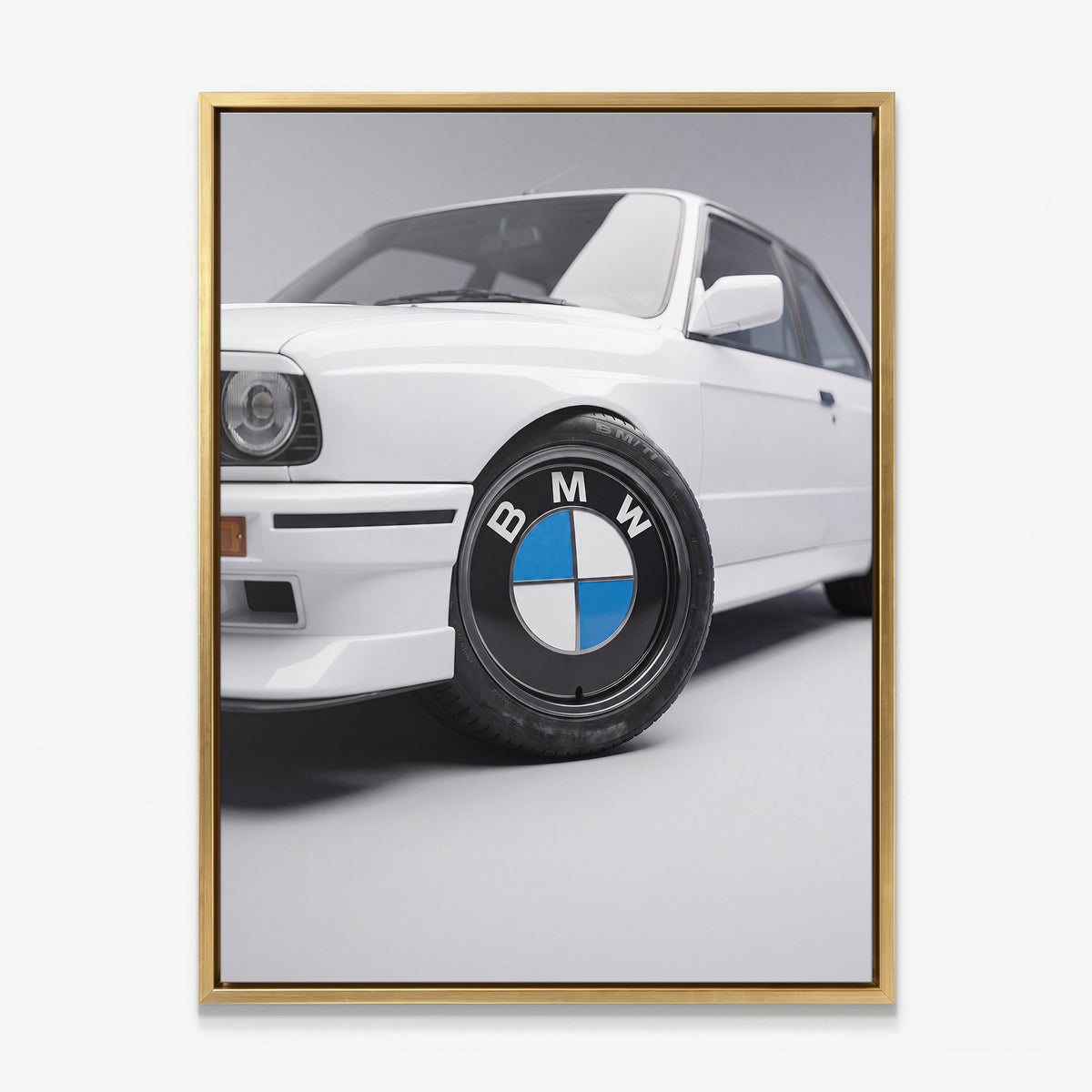 Wheels For Winners German motorsport racing wheel canvas wall art in a gold floating frame