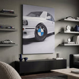 Wheels For Winners German motorsport racing wheel canvas wall art in a dark enthusiast den