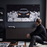 Wolves Of The Autobahn dark German coupe with an arctic wolf pack in the snow canvas wall art in a styled study