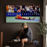 Person admiring the Worth Everything tennis canvas print in a styled interior