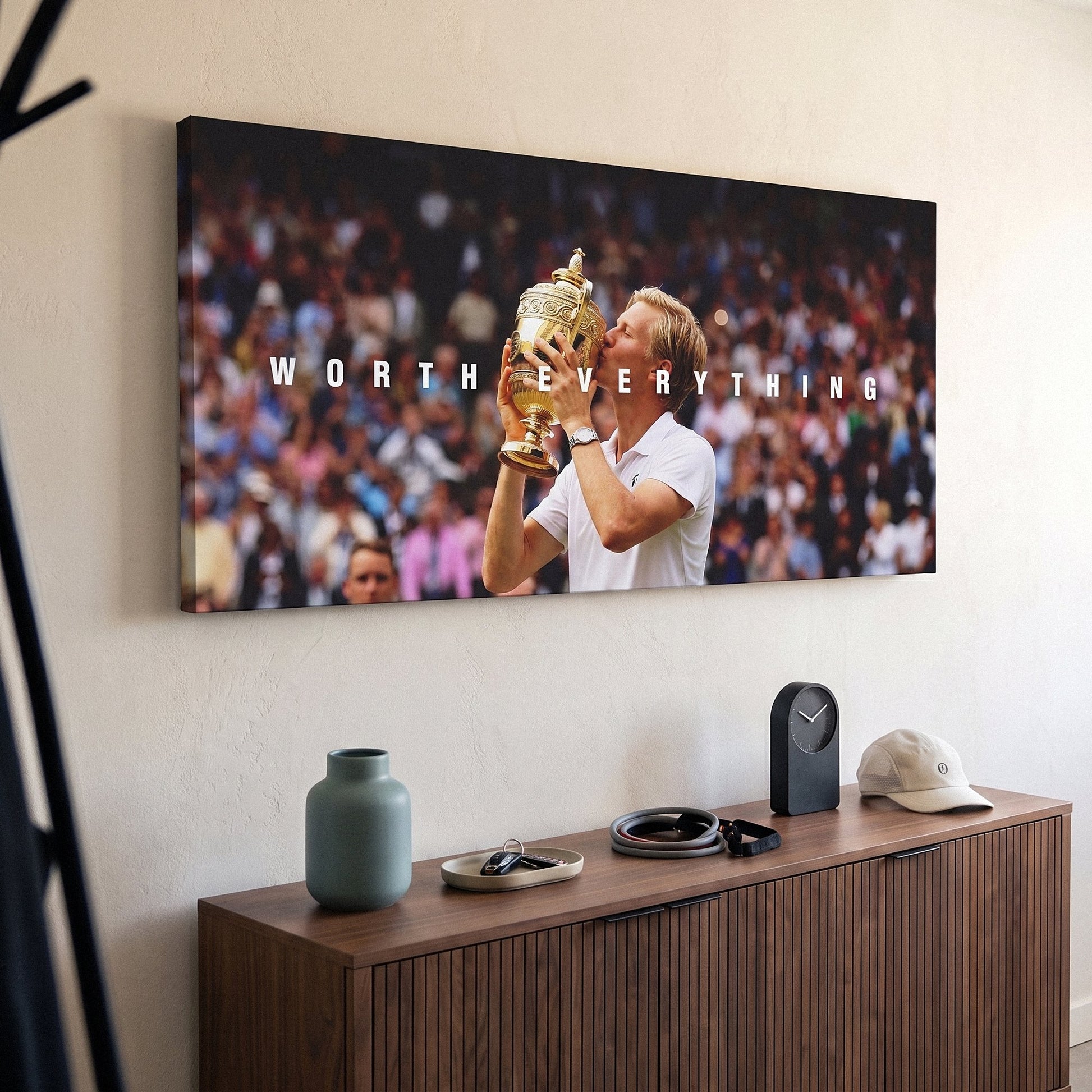 Worth Everything Trophy tennis canvas print on a living room wall at a gentle angle showing the gallery-wrapped edge
