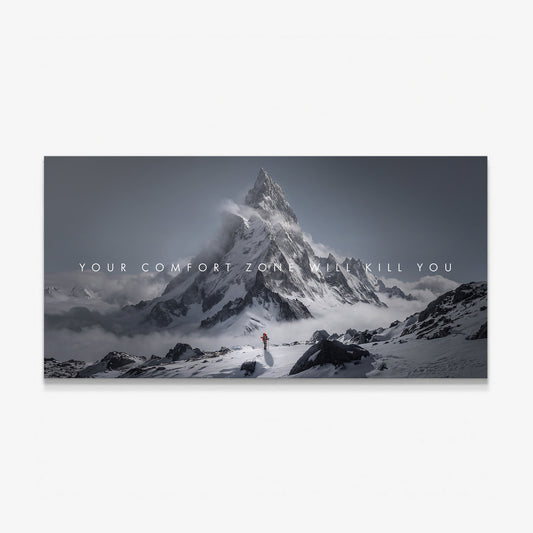 Your Comfort Zone Will Kill You canvas wall art, a lone climber in a red jacket beneath a vast snow covered peak
