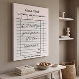 Your Peace Check canvas print above a bleached oak bench, angled view showing the gallery wrap edge